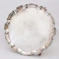Lot 263 - Birmingham Silver salver supported on three feet