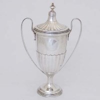 Lot 271 - London silver twin handled lidded trophy