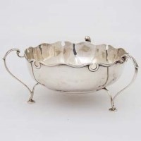Lot 276 - London silver three handled bowl