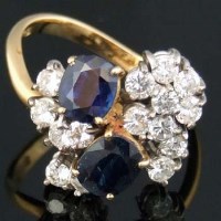 Lot 288 - 18ct sapphire and diamond fancy ring.