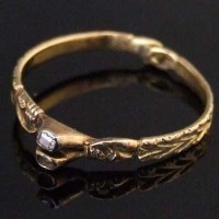 Lot 289 - Medieval gold love ring, set with one of two