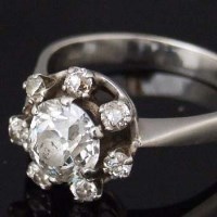 Lot 294 - Single stone diamond cluster ring.