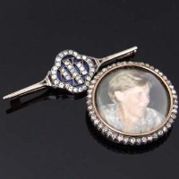 Lot 303 - Diamond XXV bar brooch and a circular portrait brooch (2).