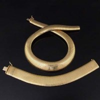 Lot 306 - 18ct gold expanding slinky spiral necklace, and a