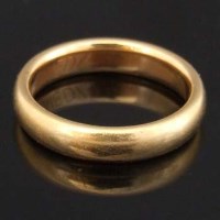 Lot 321 - 18ct gold plain band ring.