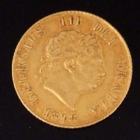 Lot 329 - George III gold half-sovereign 1818, also a Victorian crocheted purse.