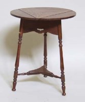 Lot 635 - Late Victorian oak triangular centre table