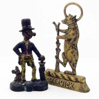 Lot 12 - Warwick bear door stop and a cast iron door stop.