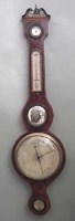Lot 14 - Mahogany barometer.