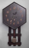 Lot 26 - Dark oak wall clock.