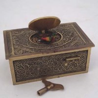 Lot 39 - Singing bird in brass box automaton.