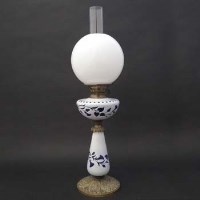 Lot 149 - Cased glass oil lamp.