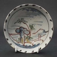 Lot 213 - Small polychrome delftware bowl.