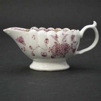 Lot 223 - Derby fluted creamboat with puce floral