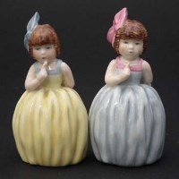 Lot 285 - Two Royal Worcester 'Hush' candle snuffers.
