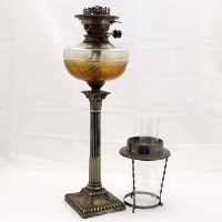 Lot 41 - Corinthian column oil lamp.
