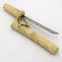 Lot 104 - Japanese ivory hamidashi tanto.
