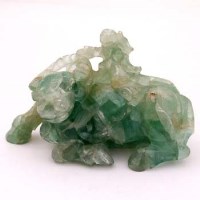 Lot 115 - Chinese green quartz boy on a buffalo.