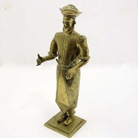 Lot 128 - Brass figure of an Indian courtier