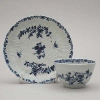 Lot 136 - Worcester teabowl and saucer painted with “Feather Moulded Floral” pattern, both with similar workman’s marks