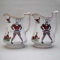 Lot 159 - Two Elsmore Forester cock fighting puzzle jugs.