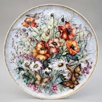 Lot 173 - Circular plaque painted by Ivy Johnson with flora