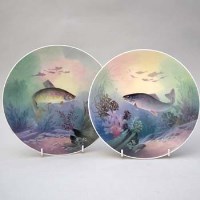 Lot 186 - Pair of Minton plaques by Je Dean, fish.