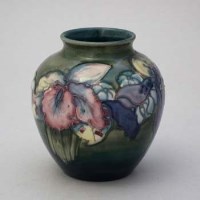 Lot 208 - Moorcroft Orchid pattern vase.