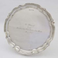 Lot 254 - Silver waiter with engraved dedication.