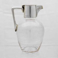 Lot 263 - Silver mounted claret jug.