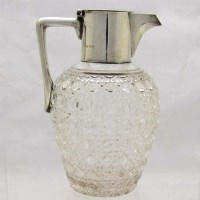 Lot 273 - Silver necked claret jug.