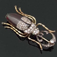 Lot 288 - Russian 14ct gold amber and diamond brooch in the
