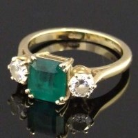 Lot 299 - 18ct gold emerald and diamond ring