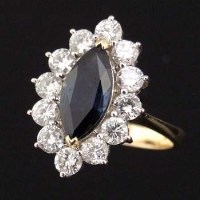 Lot 300 - Sapphire and diamond navette cluster ring.