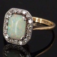 Lot 309 - Opal and diamond ring