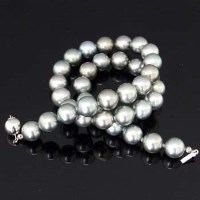 Lot 338 - Tahitian pearl necklace on 14ct gold clasp