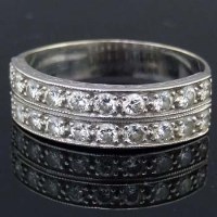 Lot 345 - Half hoop diamond eternity ring.