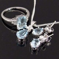 Lot 381 - Aquamaring and diamond white gold ring, also a