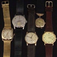 Lot 401 - 9ct gold watch, Omega gents watch, gold Swiss watch, Helvetya watch, and a Raymond Weil watch.