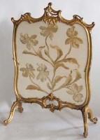 Lot 657 - Louis X1V style gilt wood fire screen