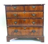 Lot 664 - Walnut chest of drawers.