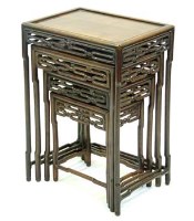 Lot 671 - Chinese rosewood nest of four tables