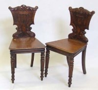 Lot 698 - Pair of Victorian oak hall chairs