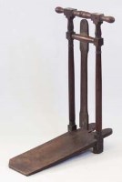 Lot 723 - Mahogany boot jack, 19th Century