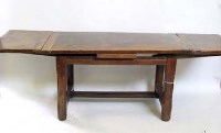 Lot 776 - French oak draw-leaf refractory table