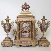 Lot 18 - Clock garniture.