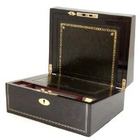 Lot 29 - Coromandal and brass writing slope.