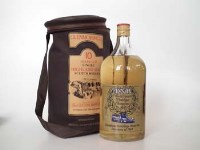Lot 53 - A large glass Flagon containing 'Ten Year Old'