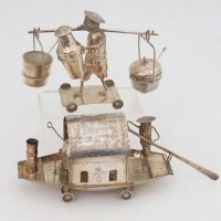 Lot 91 - 2 Chinese white metal cruet sets.