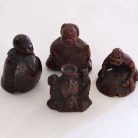 Lot 93 - Four boxwood netsukes.